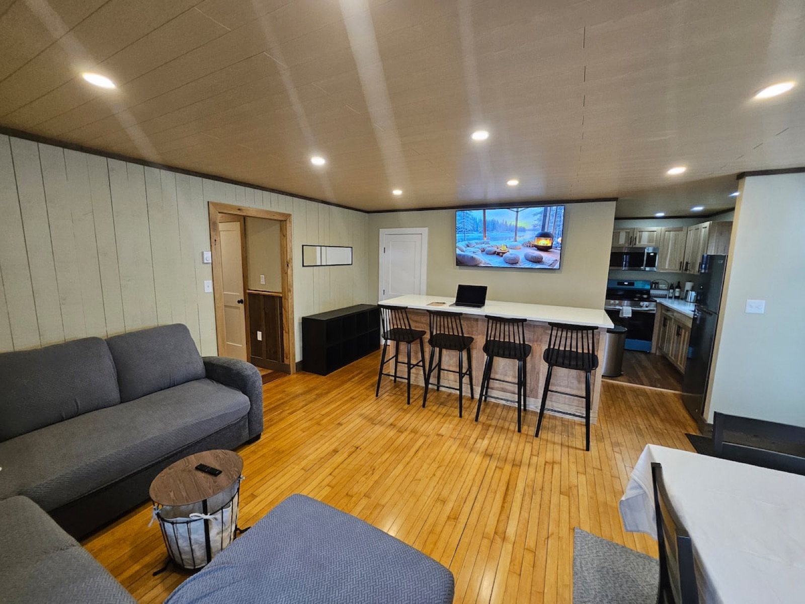 Living room and kitchen bar in Apartment 2